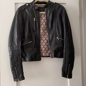 Black genuine leather jacket with silver accents